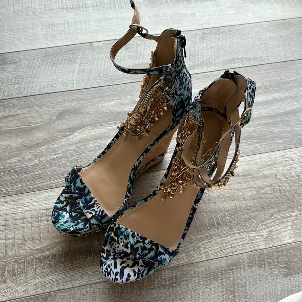 Wedges with ankle gems on them. Never worn shoe dazzle size 7.5
